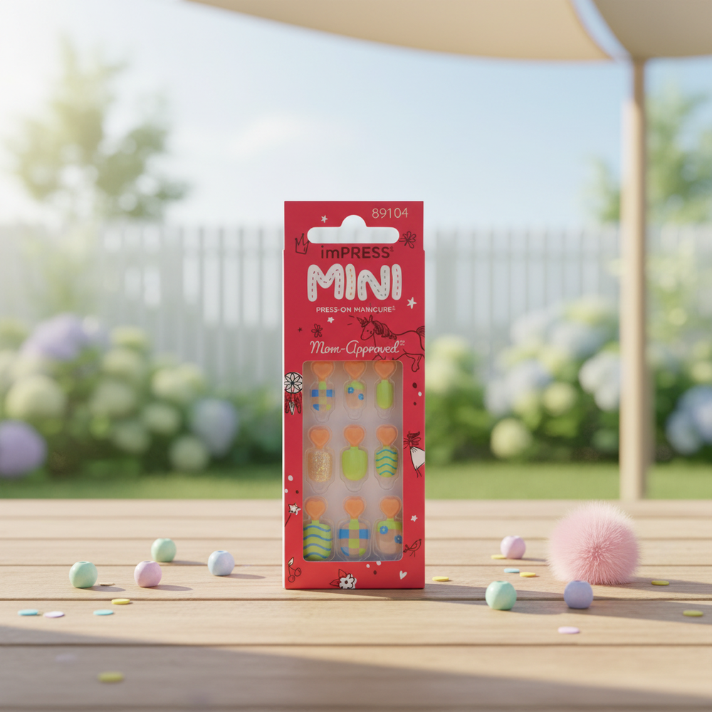 imPRESS MINI 89104 press-on manicure package in a sunny garden setting