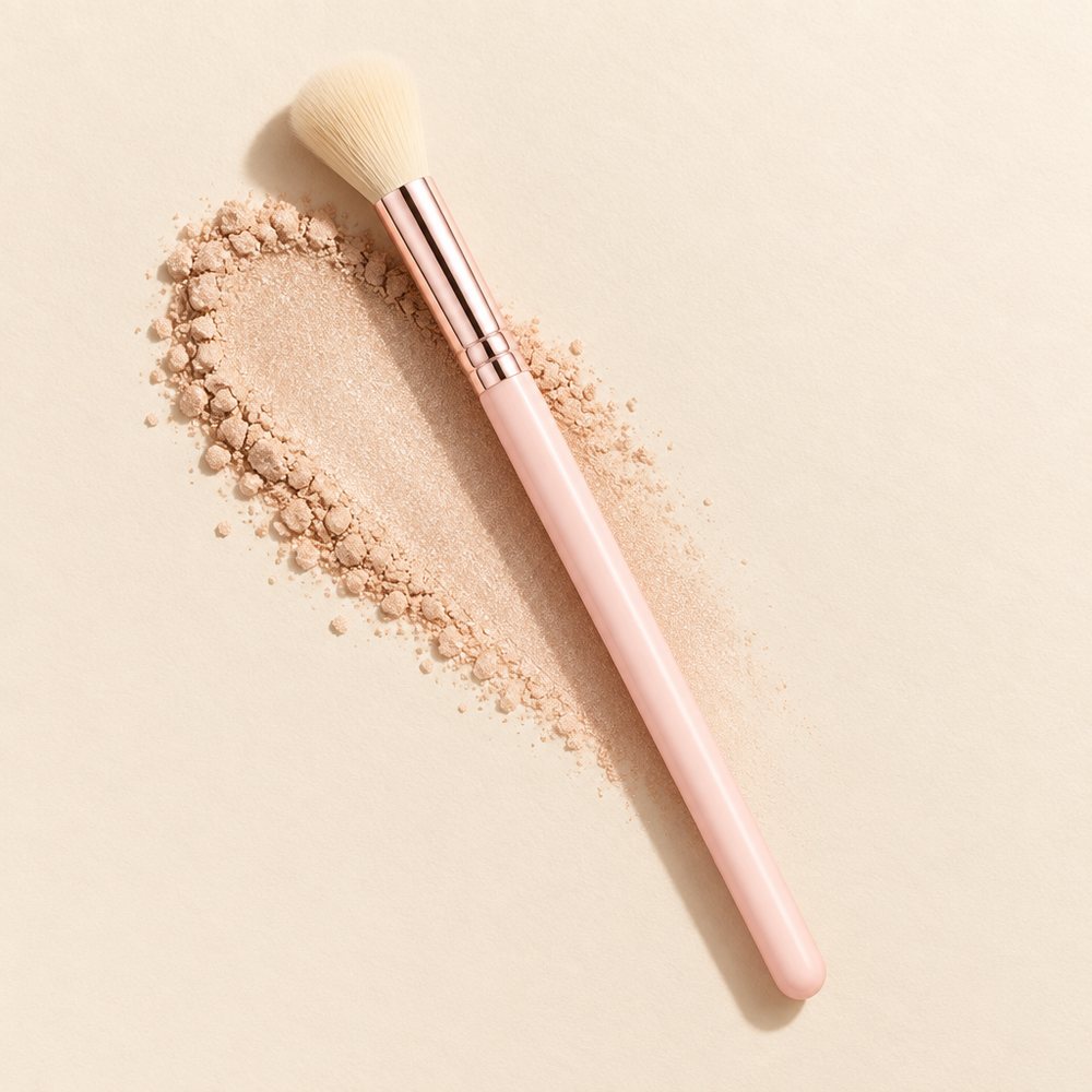 Tapered highlighter brush with powder swatch