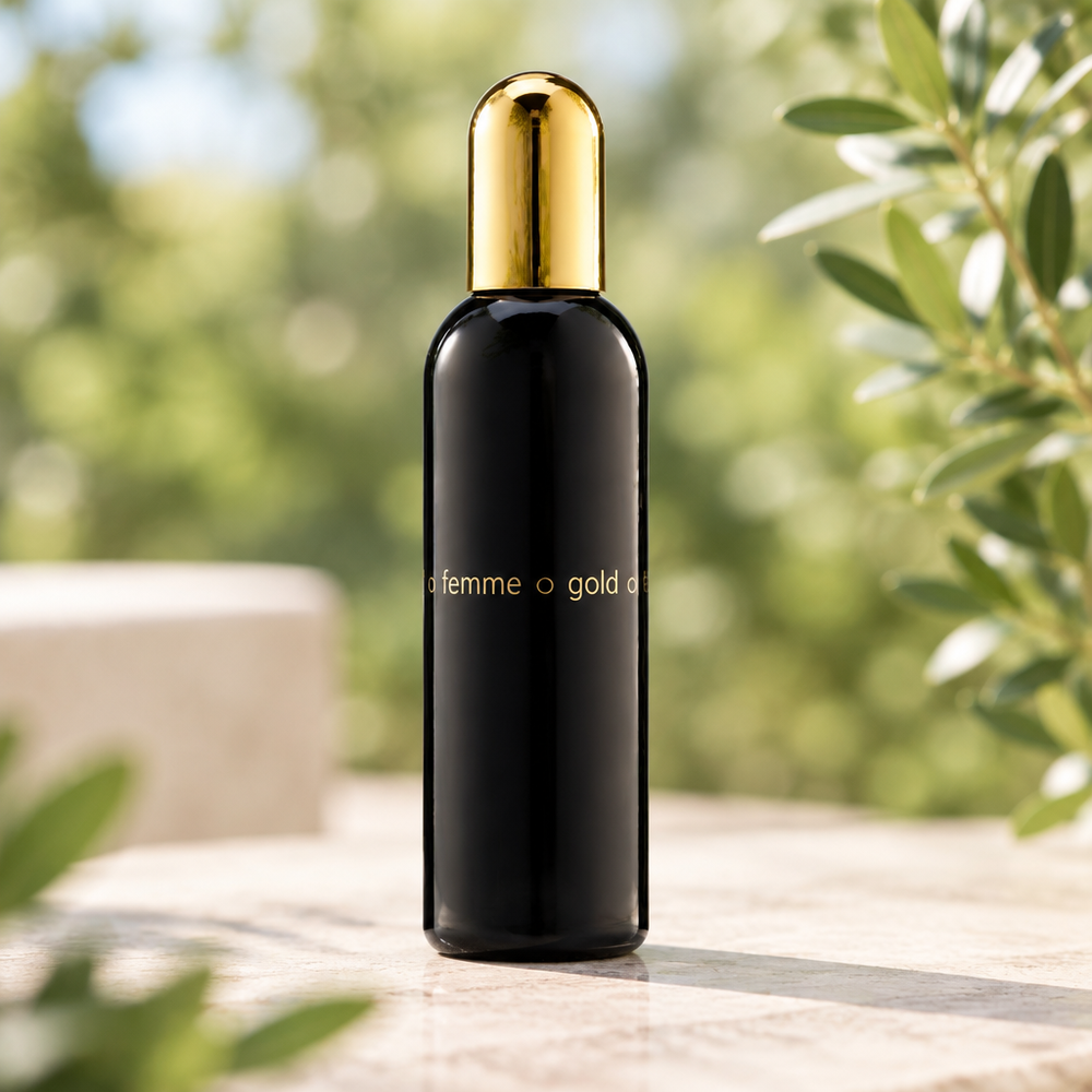Outdoor photo of femme gold perfume
