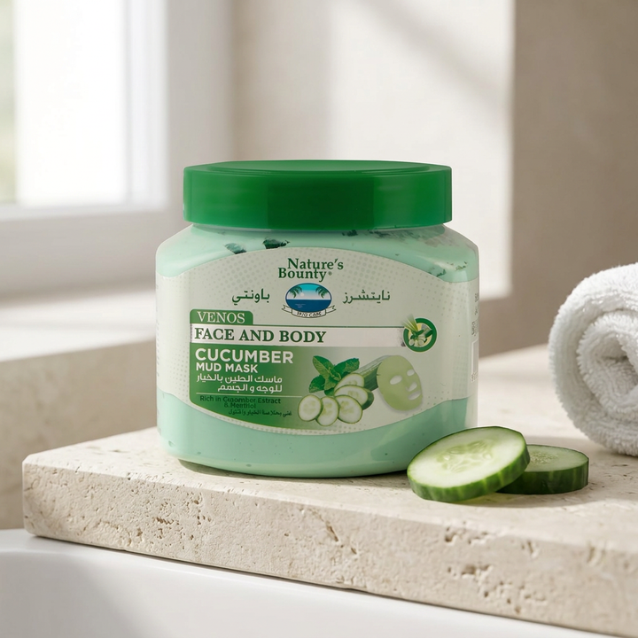 Venos Cucumber Mud Mask jar with cucumber slices on a bathroom ledge
