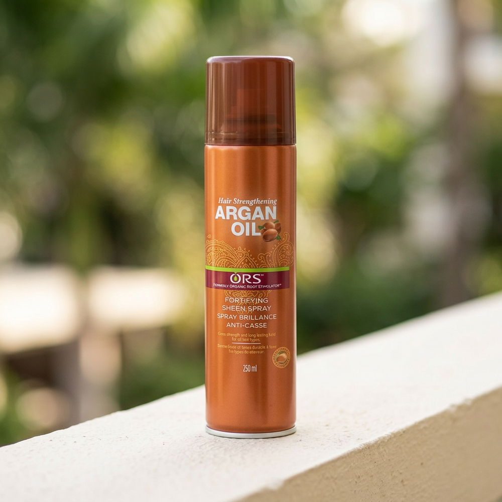 ORS Argan Oil Spray 250ml in natural outdoor light