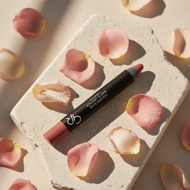 Golden Rose Matte Lipstick Crayon in an outdoor rose setting