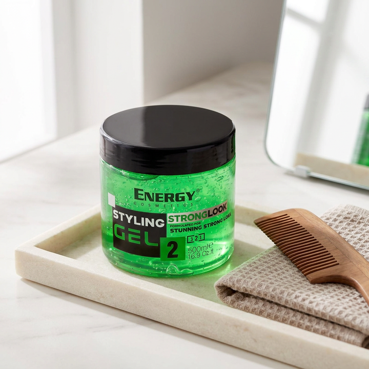 Energy Strong Look 2 Styling Gel with comb on ivory vanity