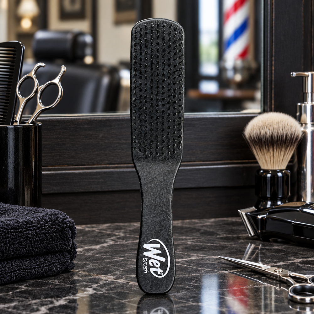 Black WetBrush Styler for Men on barbershop counter