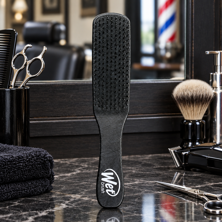 Black WetBrush Styler for Men on barbershop counter
